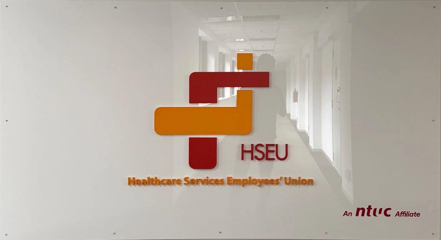 HSEU NTUC acrylic logo signage — Acrylic Signage by Garrison Productions, Singapore