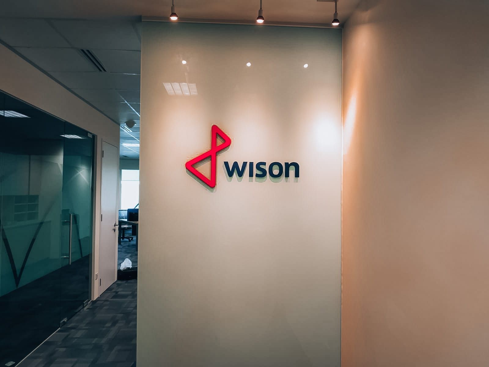 Wison 3D logo signage in an office — Backlit Signage by Garrison Productions, Singapore