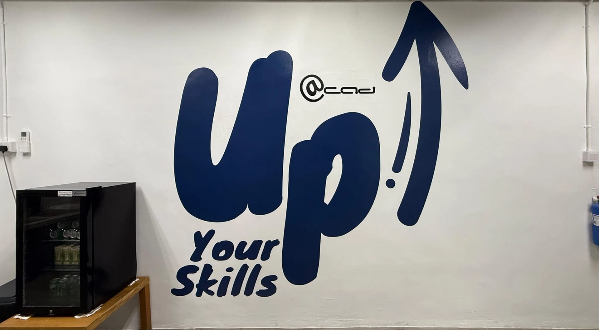 "Up your skills" die-cut logo wall sticker — Die Cut Stickers by Garrison Productions, Singapore