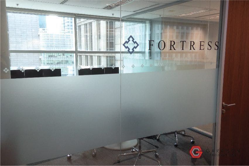 Fortress logo frosted film on a meeting room — Frosted Film by Garrison Productions, Singapore