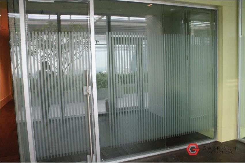 Striped frosted film on glass office doors — Frosted Film by Garrison Productions, Singapore