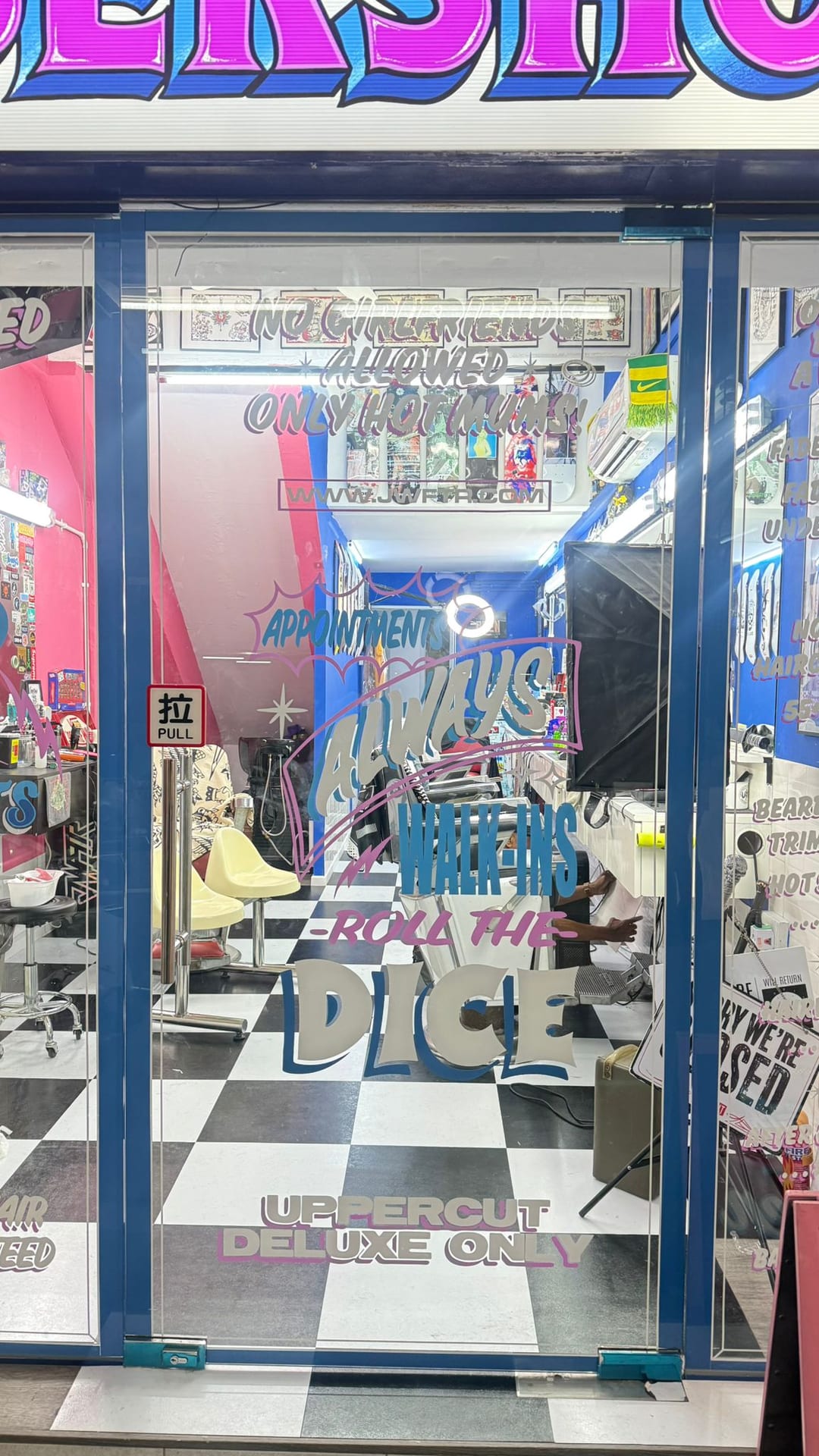 Retail shopfront glass stickers in a mall — Glass Stickers by Garrison Productions, Singapore