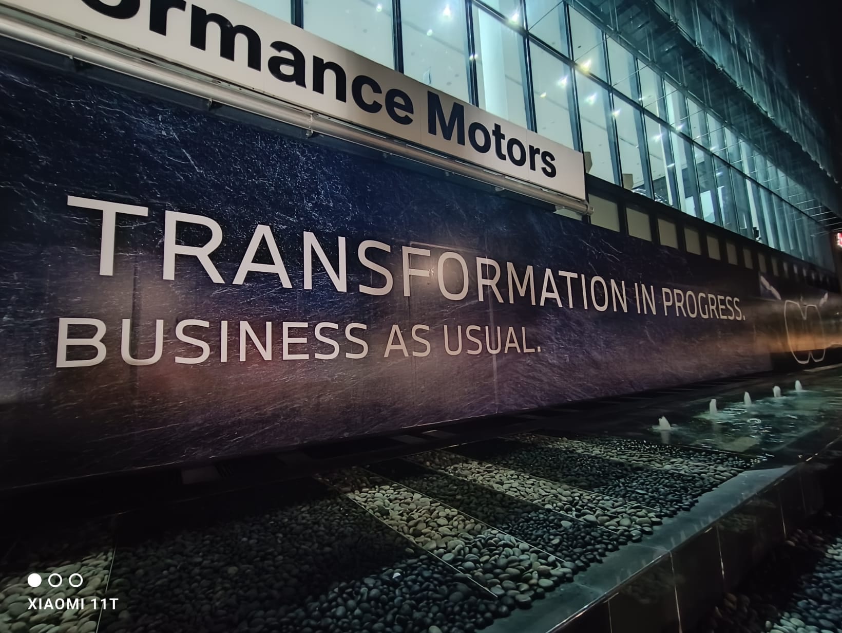 BMW Performance Motors "Business as usual" hoarding close-up — Hoarding Sticker Printing by Garrison Productions, Singapore