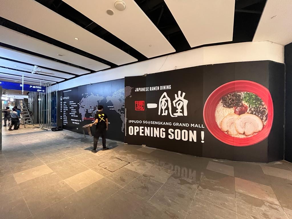Ippudo "Opening soon" black mall hoarding — Hoarding Sticker Printing by Garrison Productions, Singapore
