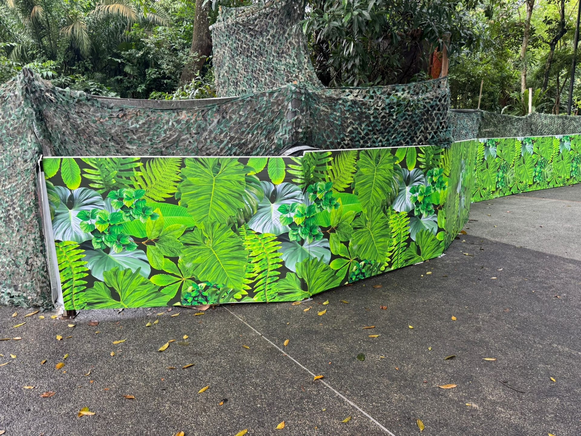 Mandai Wildlife Reserve green hoarding at the park entrance — Hoarding Sticker Printing by Garrison Productions, Singapore
