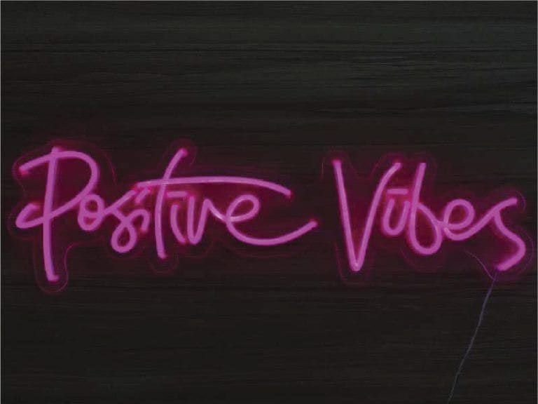 "Positive vibes" pink neon sign — Neon Signs by Garrison Productions, Singapore