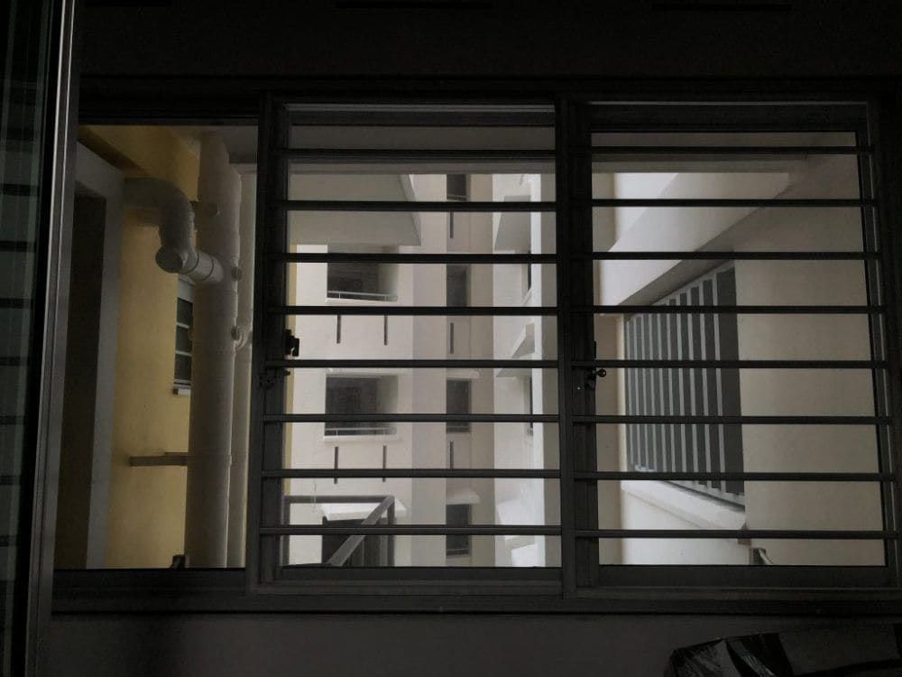 Solar film on HDB windows at night — Solar Film by Garrison Productions, Singapore