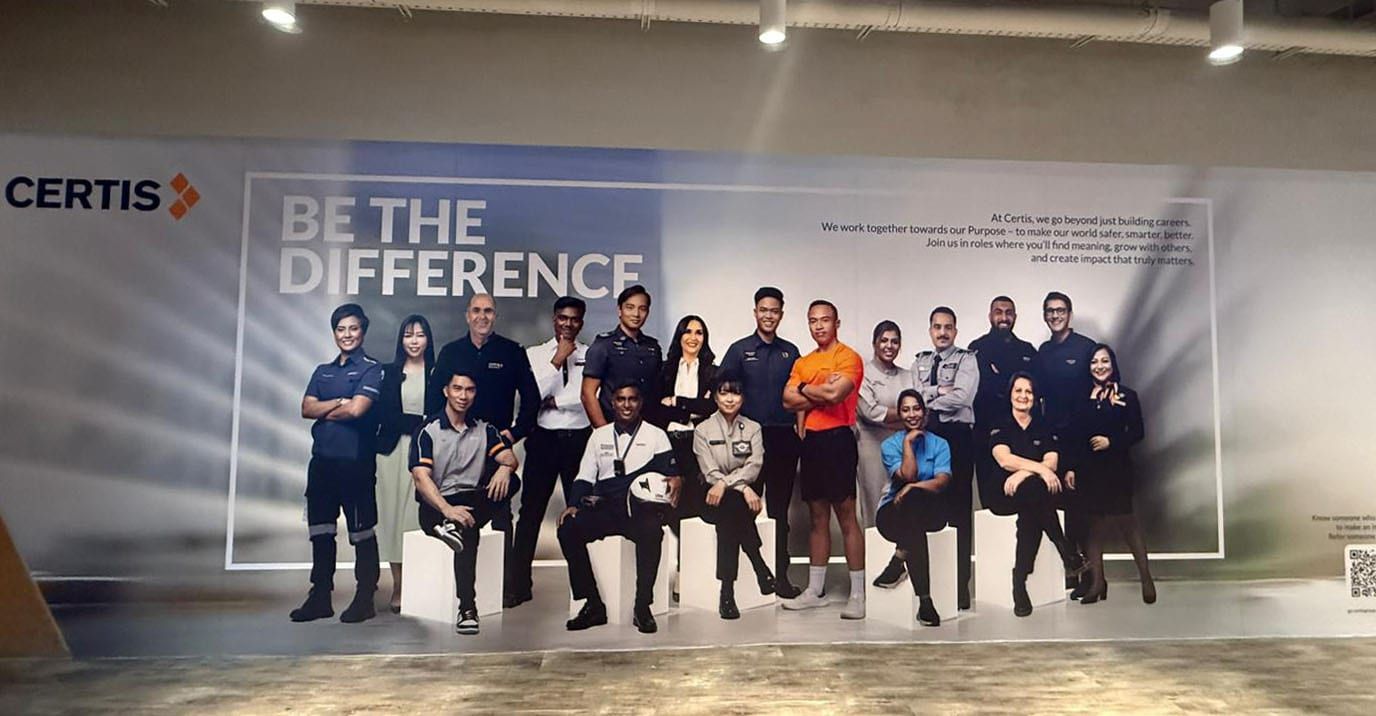 Certis "Be the difference" team photo wall mural — Wall Mural by Garrison Productions, Singapore