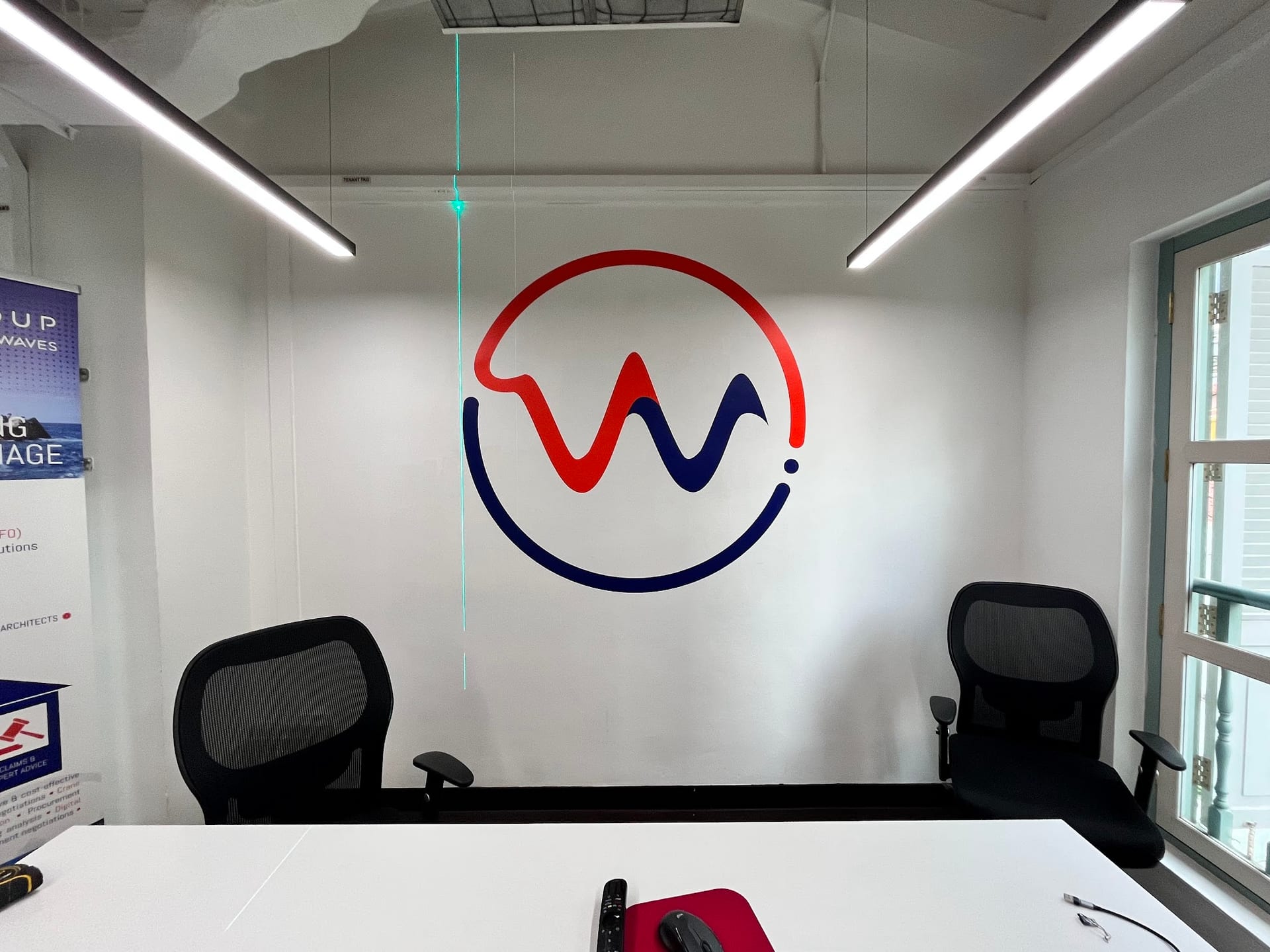 Company logo wall graphic in a meeting room — Wall Mural by Garrison Productions, Singapore